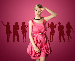 Image showing sexy female stewardess in pink