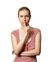 Image showing Sporty woman with finger near mouth