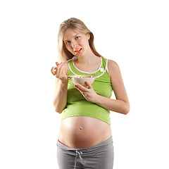 Image showing tender pregnant female with salad