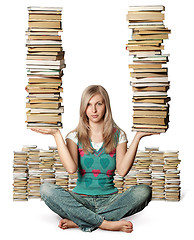 Image showing woman in lotus pose with many books in her hands