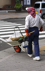 Image showing Cleaning the street