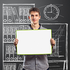 Image showing male with write board in his hands