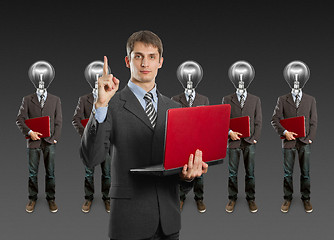 Image showing lamp head businesspeople with laptop