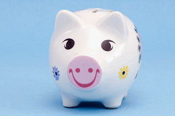 Image showing Isolated white pig-box on white. Saving money 