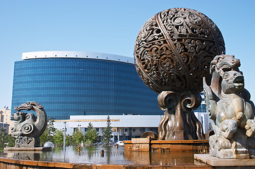 Image showing Fountain and business building