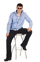 Image showing Guy sitting on the chair