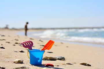 Image showing Plastic bucket on the beach