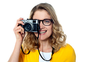 Image showing Beautiful young girl with camera