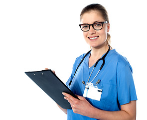 Image showing Friendly female doctor with a clipboard