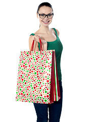 Image showing Image of glamorous shopping girl holding bags