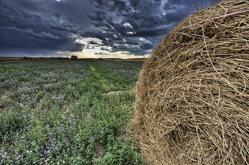 Image showing Hay Bale and Prairie Storm