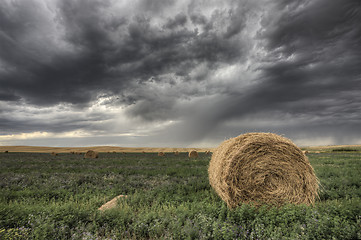 Image showing Hay Bale and Prairie Storm
