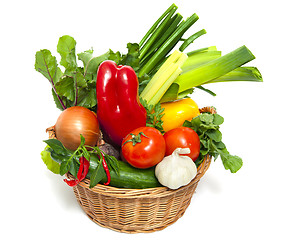 Image showing Fresh vegetables in basket isolated on white