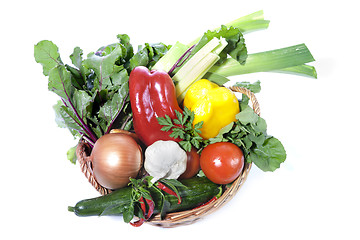 Image showing Fresh vegetables in basket isolated on white 