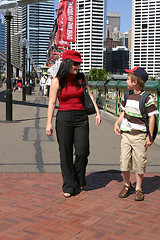 Image showing Two people strolling in the city