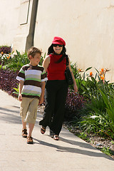 Image showing Two people strolling on a path