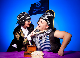 Image showing two fighting pirates on blue