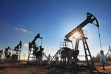 Image showing working oil pumps silhouette
