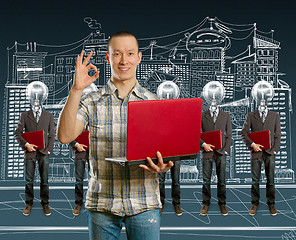 Image showing lamp head businesspeople with laptop