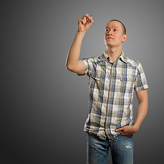 Image showing asian male with sketch signs of dollar and euro