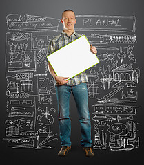 Image showing asian male with write board in his hands