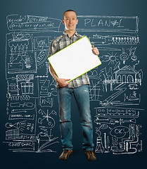 Image showing asian male with write board in his hands