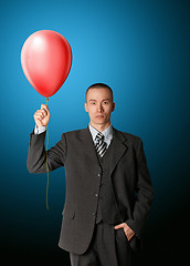 Image showing businessman in suit with the balloon