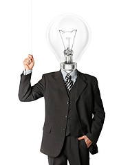 Image showing business man turn on hith bulb head