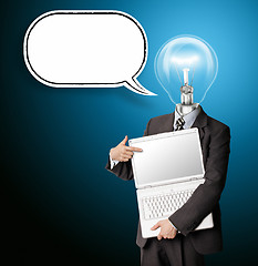 Image showing businessman with lamp-head and laptop and comics bubble