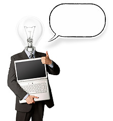 Image showing businessman with lamp-head with open laptop and bubble