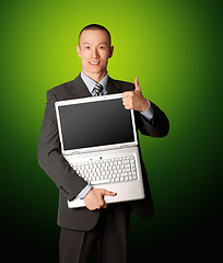 Image showing businessman with open laptop shows welldone