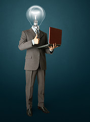 Image showing Full length portrait of lamp-head businessman with laptop