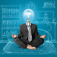 Image showing lamp-head businessman in lotus pose