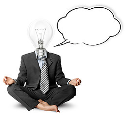 Image showing lamp-head businessman in lotus pose with speech bubble