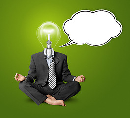 Image showing lamp-head businessman in lotus pose with speech bubble