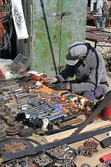 Image showing Man fixing at market