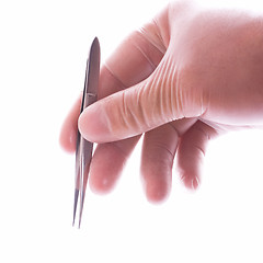 Image showing hand in rubber glove holding tweezers