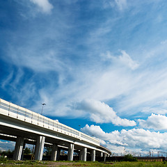 Image showing urban landscape with highway and clouds