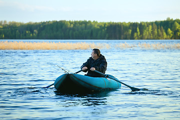 Image showing Fisherman in Rubber Boat