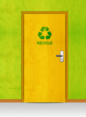 Image showing wooden door with recycle sign