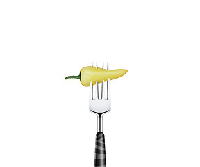 Image showing Pepper  pierced by fork,  isolated on white background 