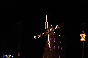 Image showing winmill at night  with lights