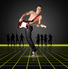 Image showing punk man with the guitar and silhouette