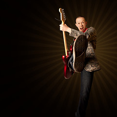 Image showing rocker with guitar and foot