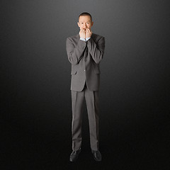 Image showing scared businessman