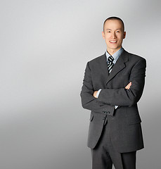 Image showing smiling business man in suit