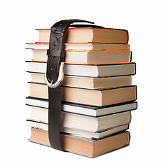 Image showing books pile with belt