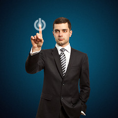 Image showing businessman push the button