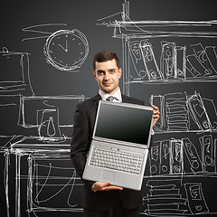 Image showing businessman with open laptop in his hands