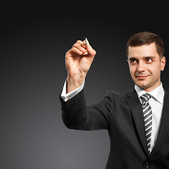 Image showing businessman writing something